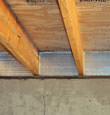 SilverGlo™ insulation installed in a floor joist in Shelbyville