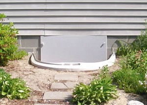 Rigid plastic crawl space access well installed in a Jackson crawl space