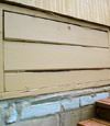 an old-fashioned crawl space door in Lebanon about to be replaced