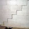 A diagonal stair step crack along the foundation wall of a Lebanon home