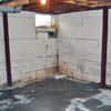 Rusted, corroded i-beams found with a failing foundation in a Manchester home.