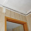 The ceiling and wall separating as the wall sinks with the slab floor in a Lebanon home