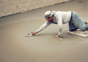 smoothing out the grout in a slab releveling project in Bowling Green