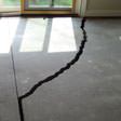 a huge crack in a concrete slab floor in Jackson
