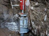 Foundation repair contractors lifting a structure in Clarksville.