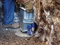 Securing a foundation footing bracket for a foundation repair system in Hopkinsville.