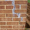 Tuckpointing that cracked due to foundation settlement of a Clarksville home