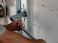 Mounting a foundation wall channel anchor in Bowling Green.