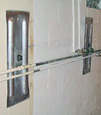 A foundation wall anchor system used to repair a basement wall in Brentwood