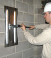 Tightening a wall anchor plate in Murfreesboro, Tennessee, Kentucky, and Alabama