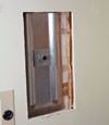 Wall anchor plates installed during a foundation repair in Clarksville in a finished basement