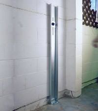 A failing foundation wall repaired with a foundation wall channel anchor system in a Murfreesboro home.