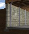 I-beam foundation wall supports installed in a Springfield basement.
