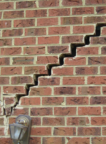 major cracking of a brick foundation wall in Murray