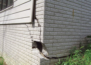 A severely damaged foundation wall in Smyrna