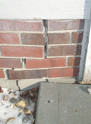 Severe street creep damage to a garage wall outside a Goodlettsville home