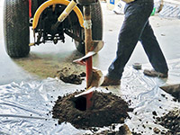 Digging the hole used for wall anchor installation in Lebanon.