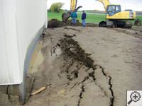 A foundation wall showing severe damage from bowing and buckling in Antioch