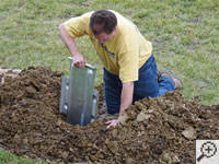 Positioning an earth anchor for the steel shaft installation in Tullahoma.
