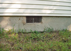 Open crawl space vents that let rodents, termites, and other pests in a home in Hopkinsville