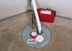 A sump pump system with a battery backup system installed in Brentwood