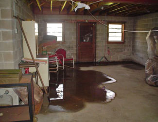 a flooded basement floor in a Old Hickory home