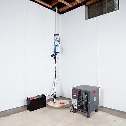 Sump pump system, dehumidifier, and basement wall panels installed during a sump pump installation in Columbia