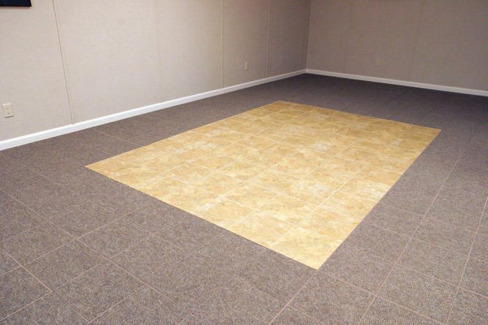 tiled and carpeted basement flooring installed in a Murfreesboro home