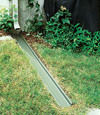 A recessed gutter drain extension installed in Old Hickory, Tennessee, Kentucky, and Alabama
