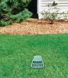 A buried gutter drain downspout extension installed in a Old Hickory home